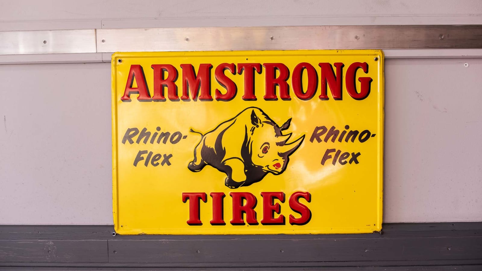 1961 Armstrong Tires RhinoFlex SingleSided Tin Sign at The World’s Largest Road Art Auction