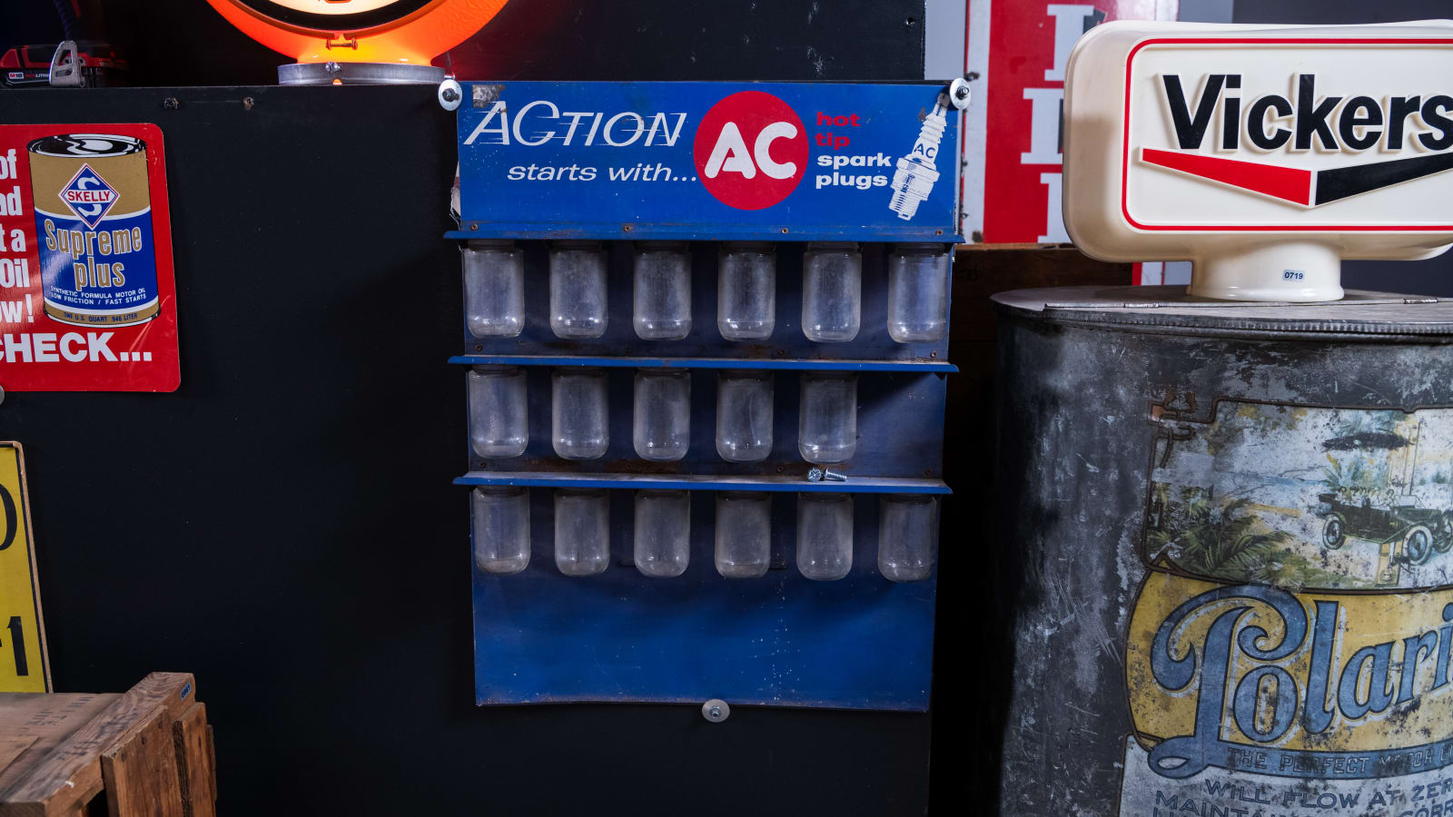 AC Spark Plug Wall Display at The World’s Largest Road Art Auction 2023