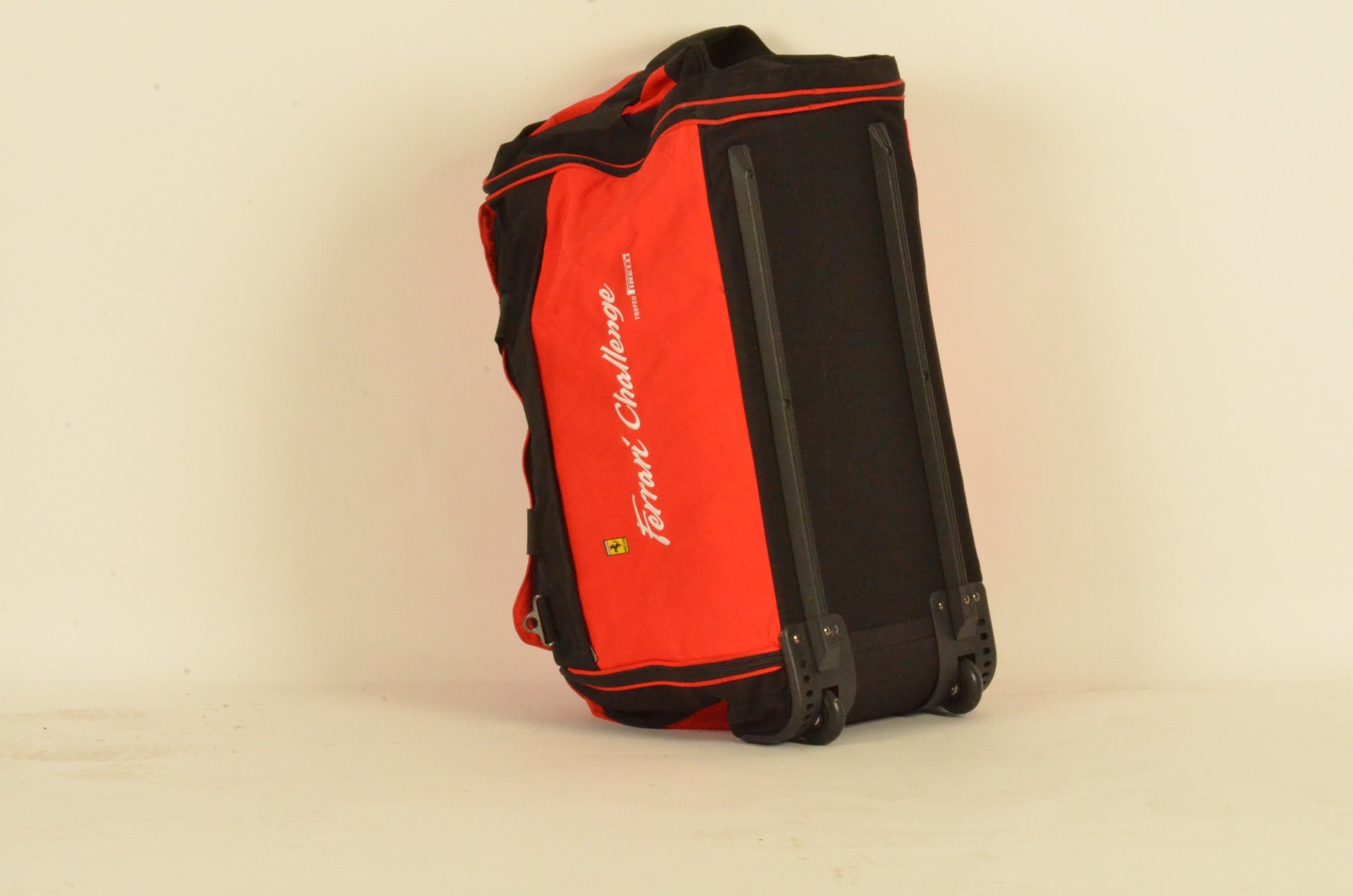 FILA Ferrari Challenge 30 Inch Rolling Duffle Bag at Monterey 2013 as