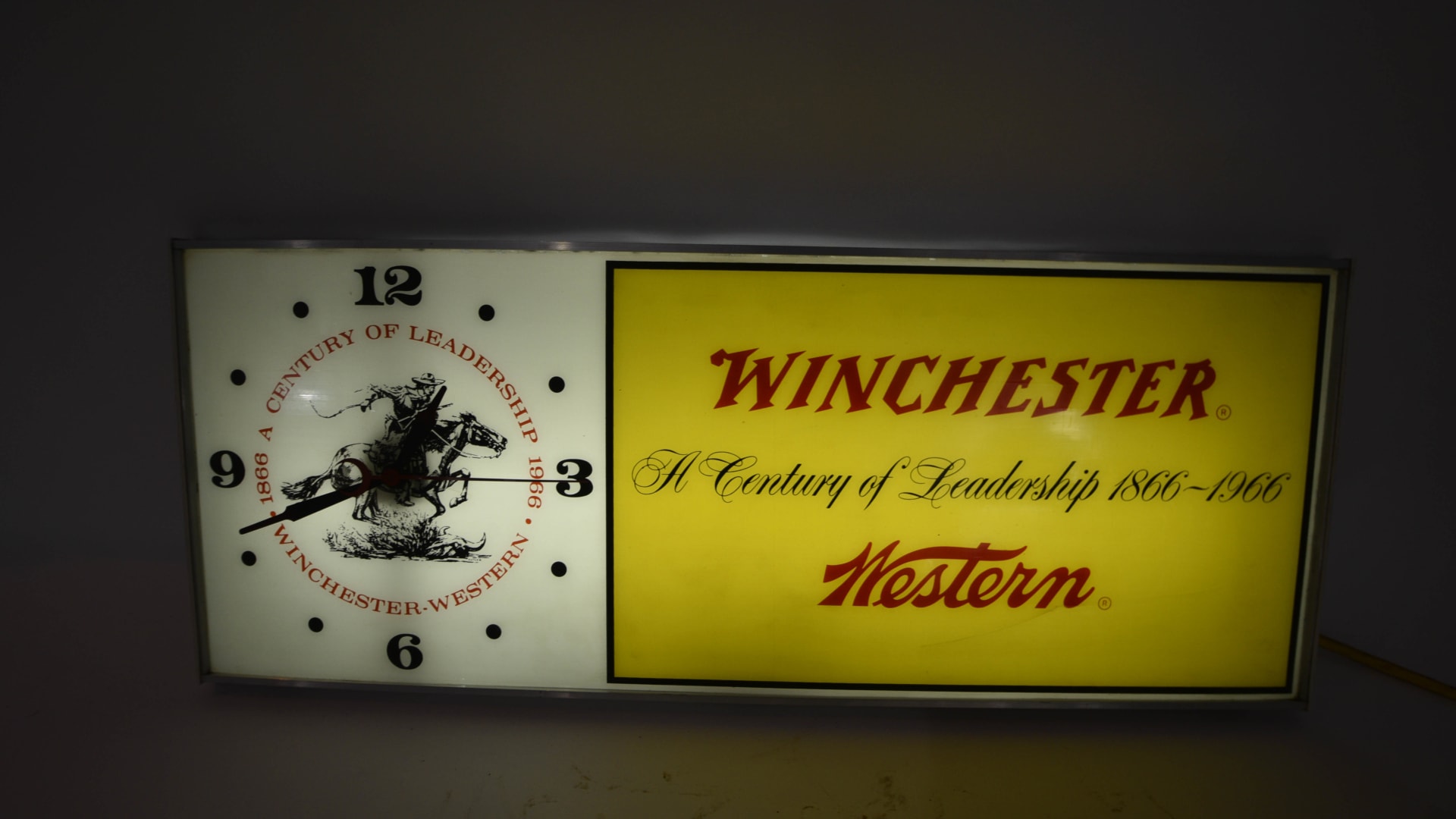 Winchester Clock Lite 31x15x6 at Davenport 2020 as T105 Mecum Auctions