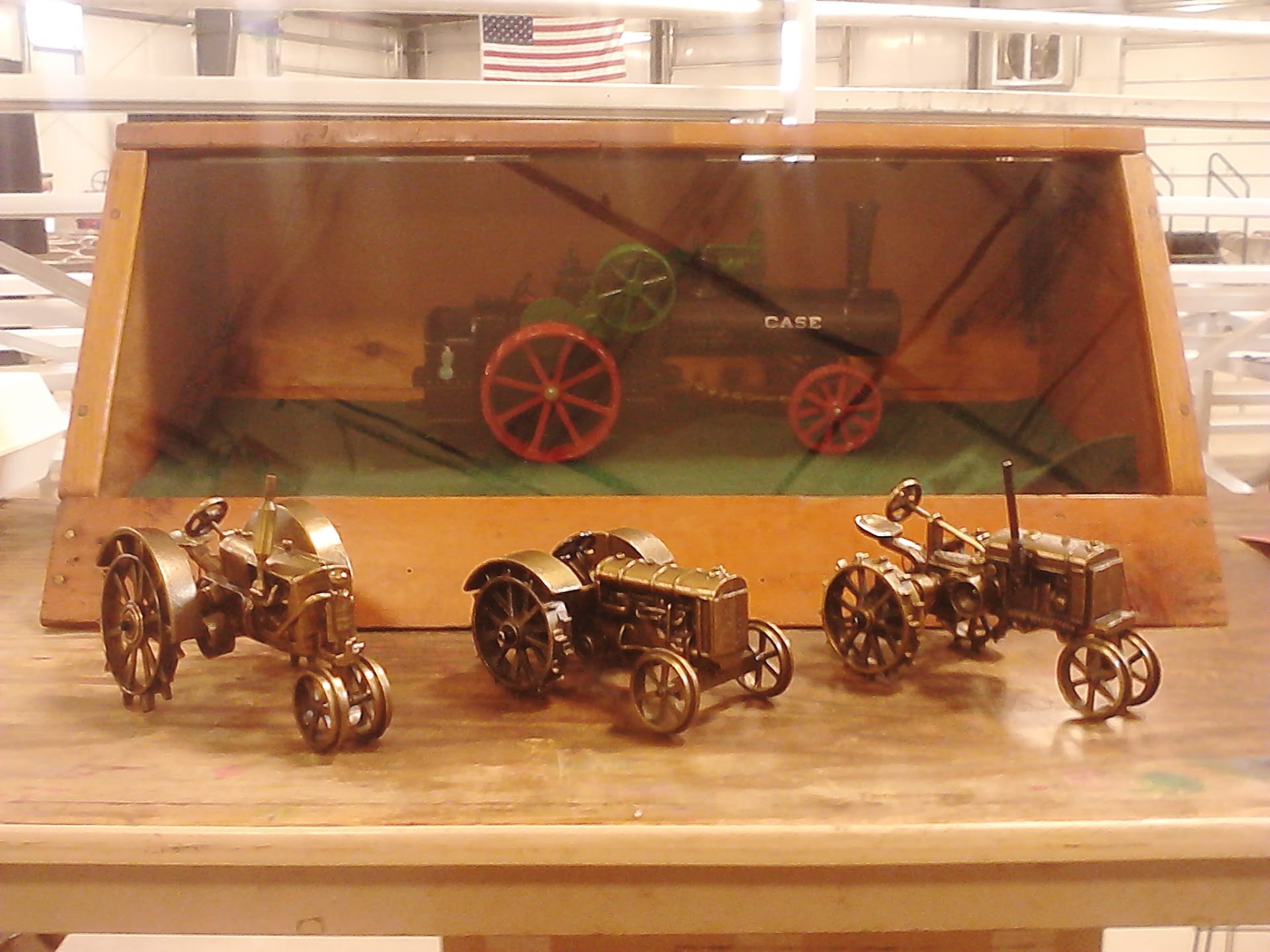 Antique Display Case And 4 Toy Tractors at Gone Farmin' Iowa Spring