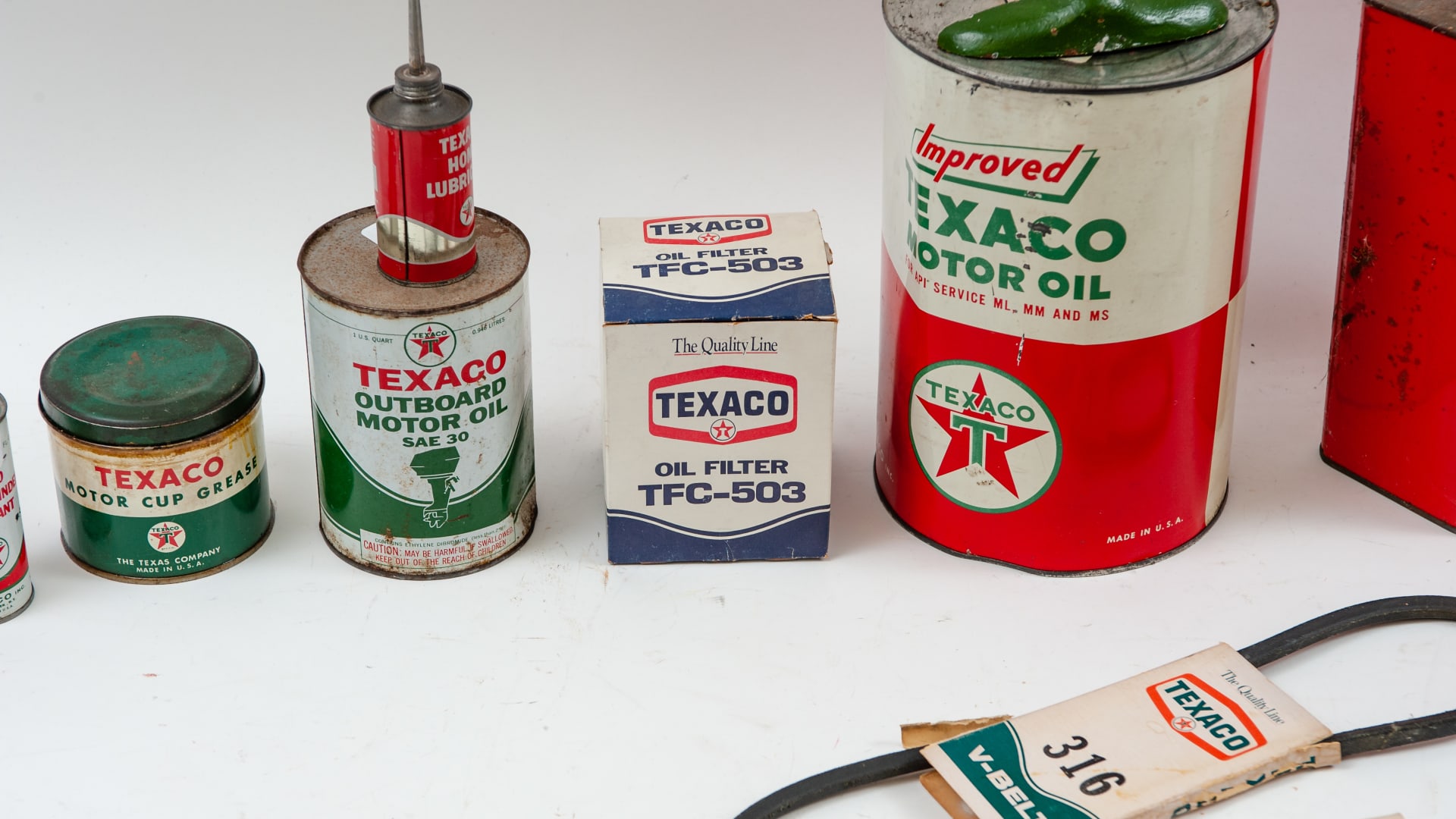 Texaco Oil Cans at Indy Road Art 2021 as B27 Mecum Auctions