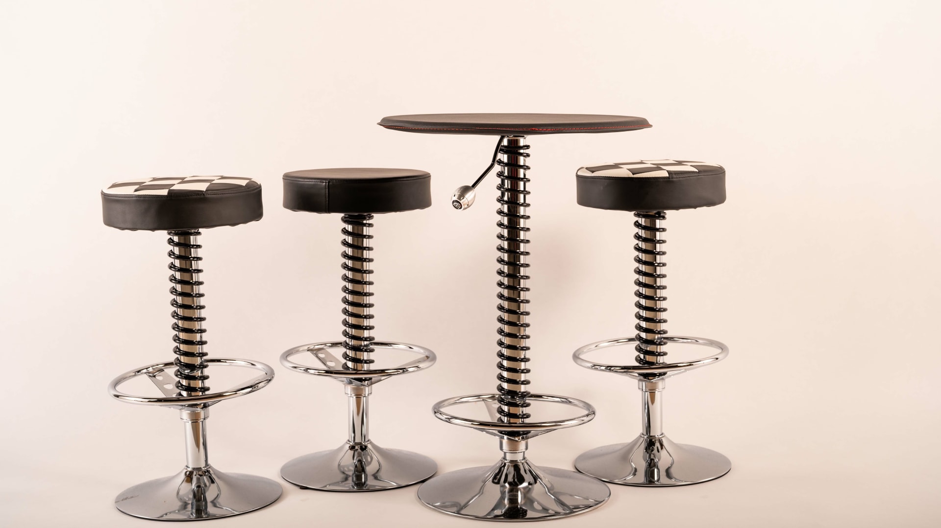 Shock Absorber Table and Stools at Indy Road Art 2022 as M420 Mecum