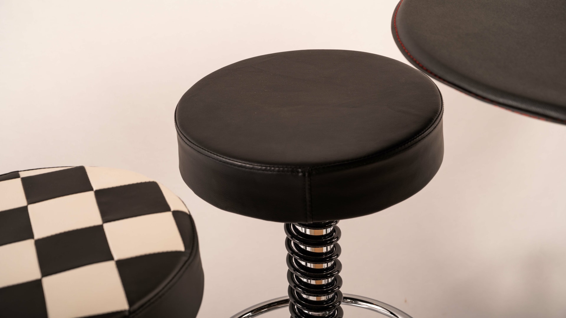 Shock Absorber Table and Stools at Indy Road Art 2022 as M420 Mecum