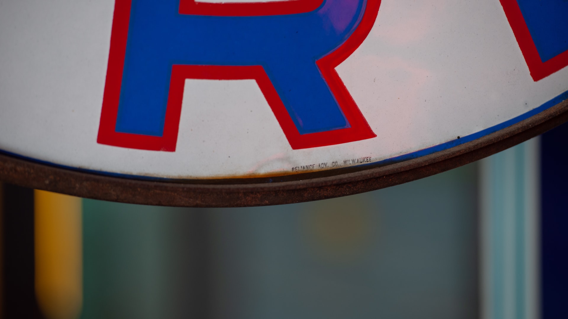 Kelly Tires Two SingleSided Porcelain Signs in Original Ring at The