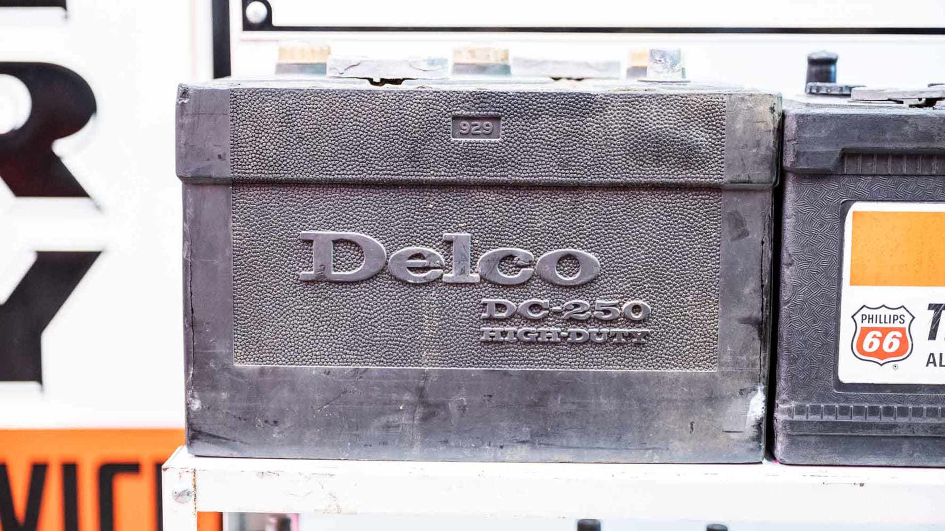 Phillips 66 Quality Batteries Display Rack and Assorted Batteries at