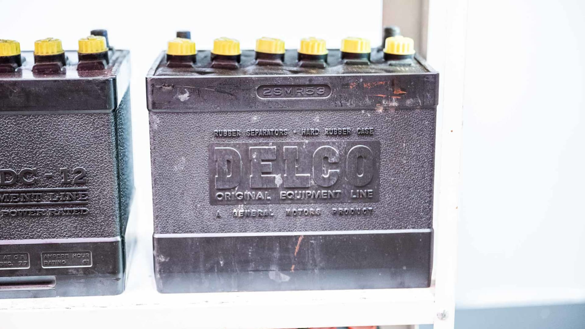 Phillips 66 Quality Batteries Display Rack and Assorted Batteries at