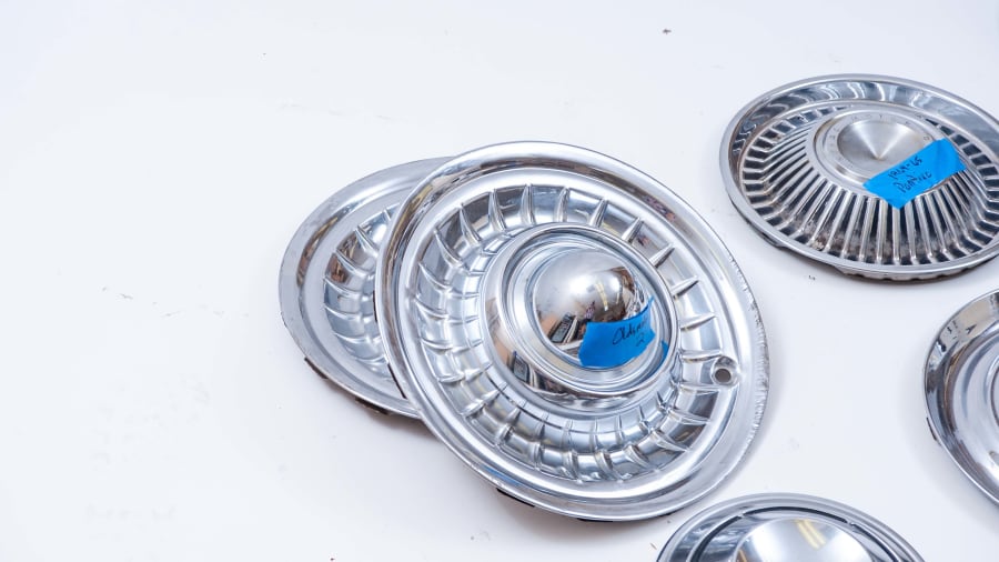 Automotive Hubcaps at Indy Road Art 2021 as B98 Mecum Auctions