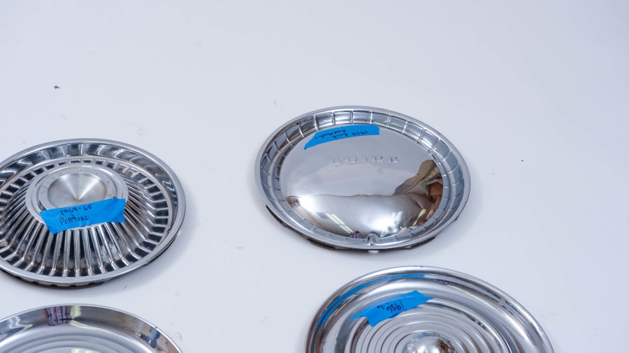 Automotive Hubcaps at Indy Road Art 2021 as B98 Mecum Auctions