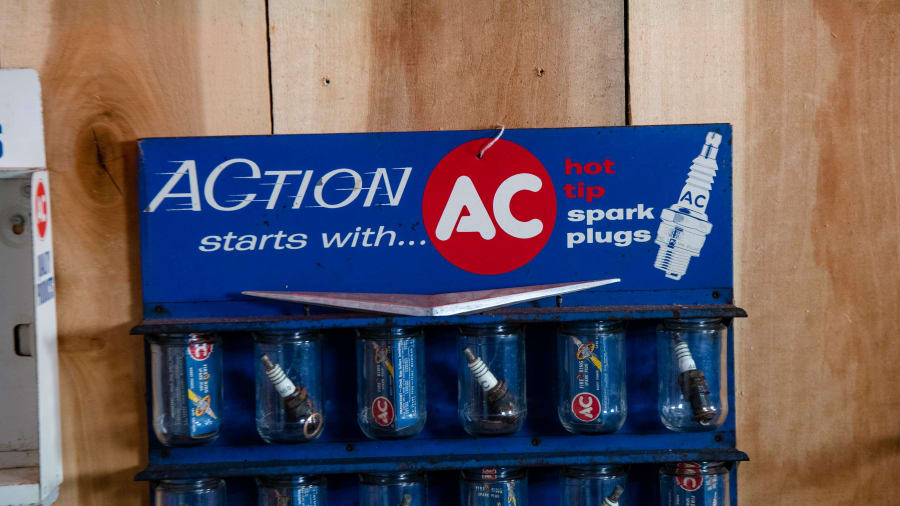 AC Spark Plug Display at Indy Road Art 2022 as E225 Mecum Auctions