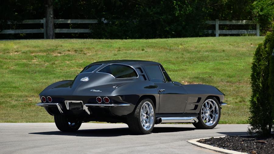 Rear three-quarter view of the 1964 Chevrolet Corvette Custom crossing the block at Mecum Monterey 2026