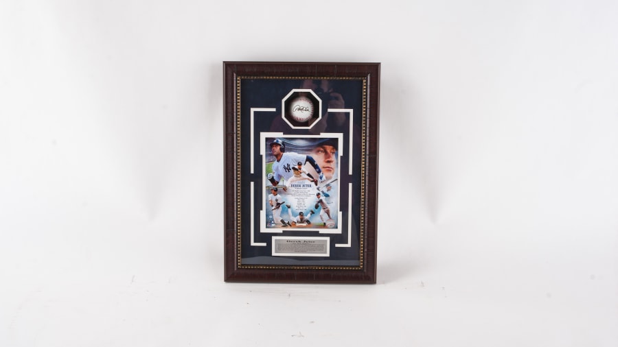 Sold at Auction: SIGNED AND FRAMED DEREK JETER 2000 WORLD SERIES NEW YORK  YANKEES JERSEY