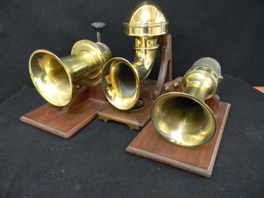 3 Mounted Brass Horns at Monterey 2014 as J38 Mecum Auctions