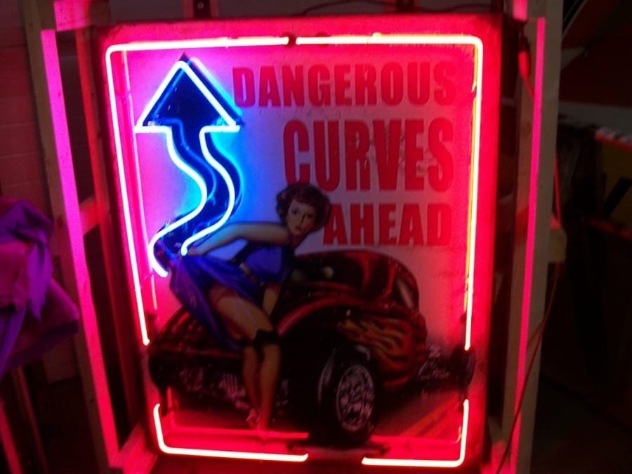 Dangerous Curves Neon Sign at Kissimmee 2013 as M383 Mecum Auctions