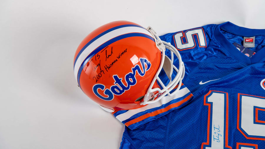 Tim Tebow Autographed Helmet, Jersey and Football at Kissimmee 2022 as M218  - Mecum Auctions