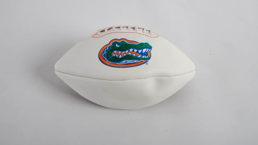 Tim Tebow Autographed Helmet, Jersey and Football at Kissimmee 2022 as M218  - Mecum Auctions