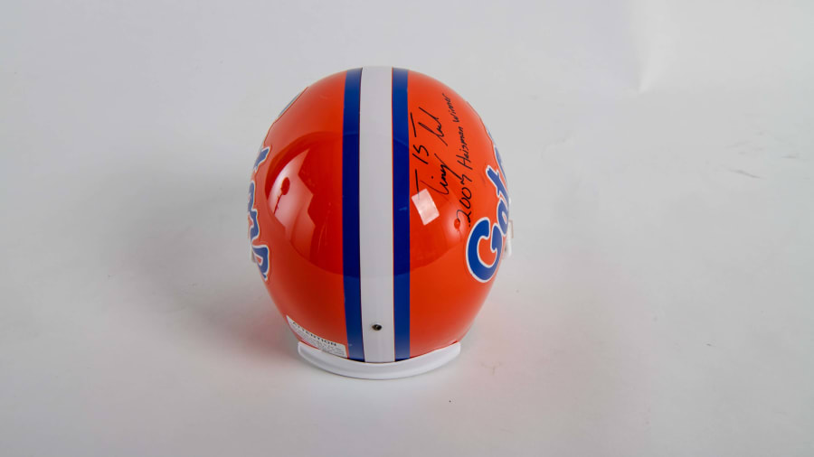 Tim Tebow Autographed Helmet, Jersey and Football at Kissimmee 2022 as M218  - Mecum Auctions