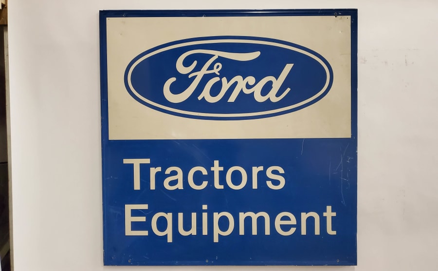 1970s Ford Tractors Equipment SingleSided Self Framed Tin 58x58 at Davenport 2020 as M1 Mecum