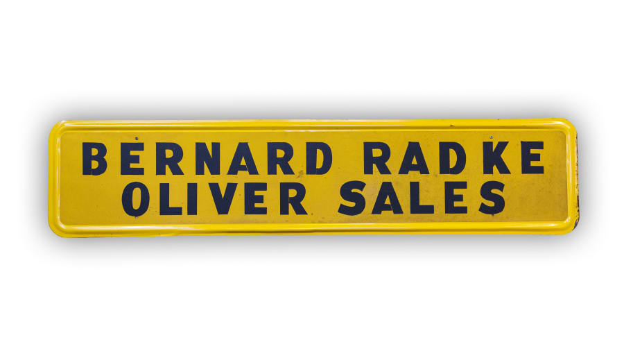Oliver Sales Reflective Tin Sign at Gone Farmin' Spring Classic 2021 as