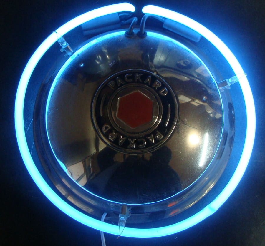 Packard Hubcap Neon Sign at Kansas City Spring 2012 as Z213 Mecum