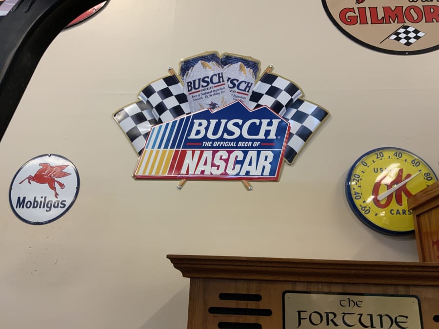 Mobilgas, Busch, And OK Used Cars Signs at Punta Gorda 2021 as H52