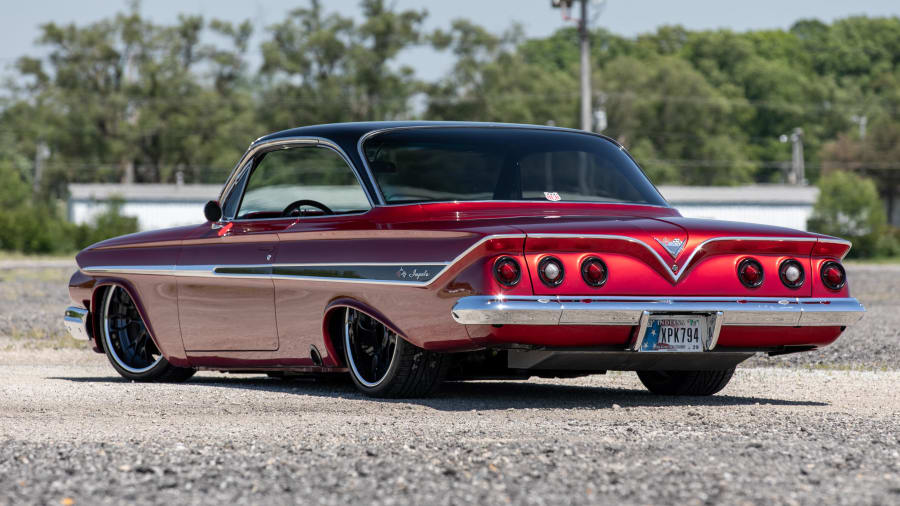 August 05 2016: Beautiful 1961 Chevy Impala with Candy Brandywine paint  scheme at the 30th Anniversary of the Hot August Nights Custom Car Show the  largest nostalgic car show in the world