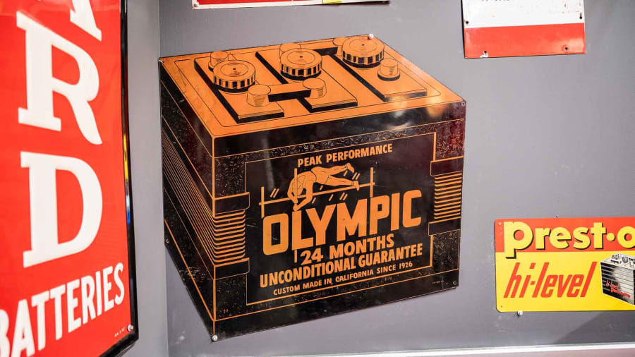 Olympic Batteries SingleSided DieCut Tin Sign for Sale at Auction