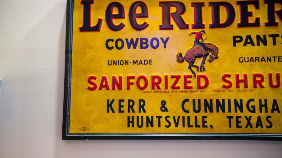 Lee Riders Cowboy Pants Single-Sided Framed Embossed Tin Sign For