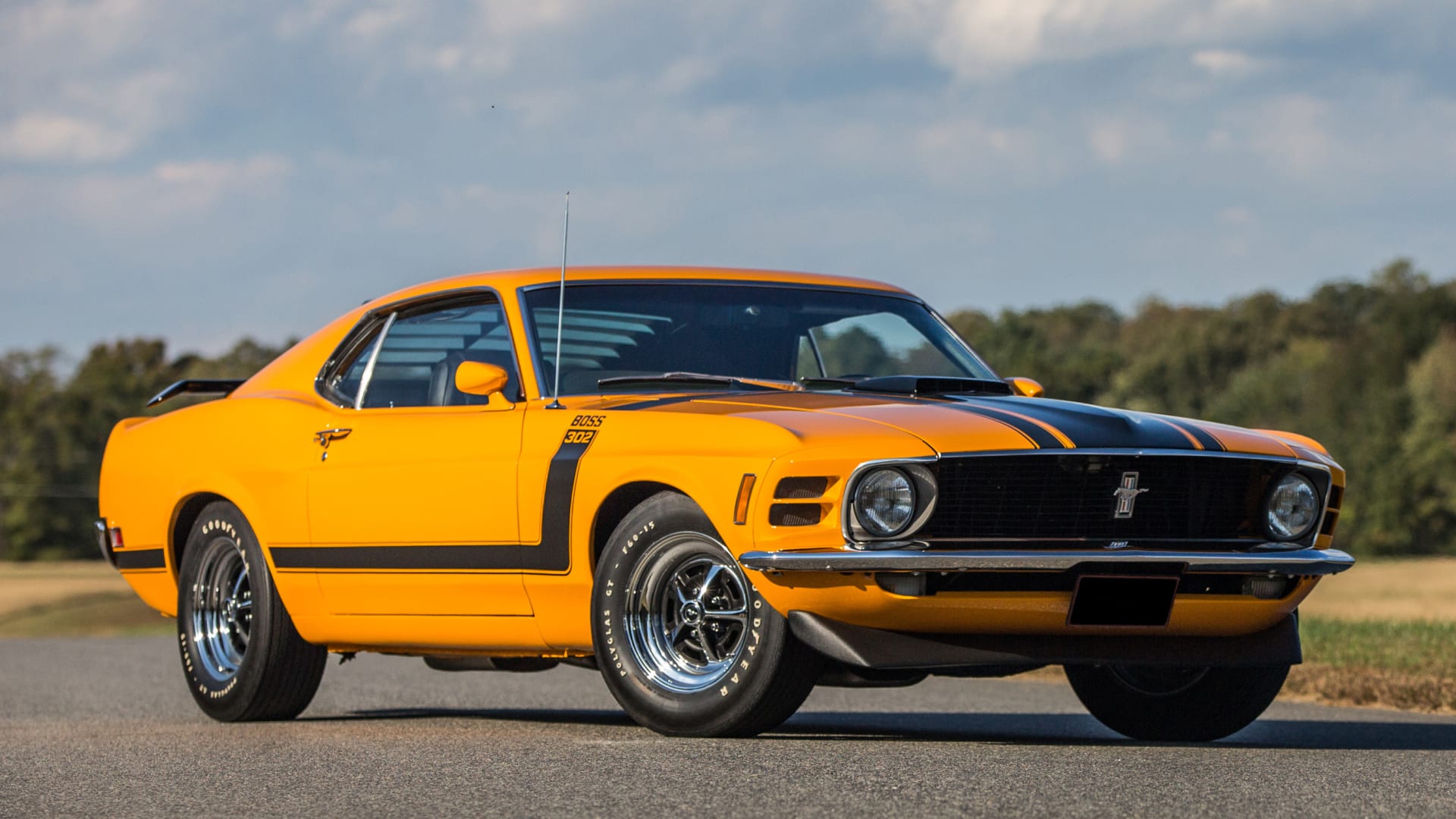 Mecum Auctions Photography Guide // orange Boss 302 three-quarter front view right facing