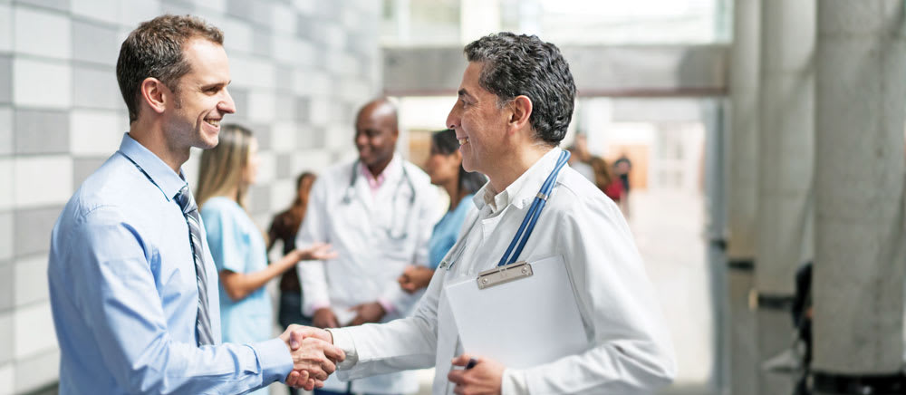 Doctor shaking patient's hand