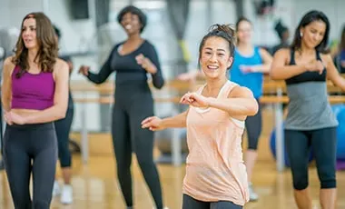 Women Excercising Doing Yoga