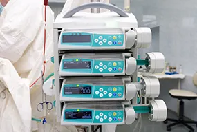 Stack of B Braun Infusomat Infusion Pumps