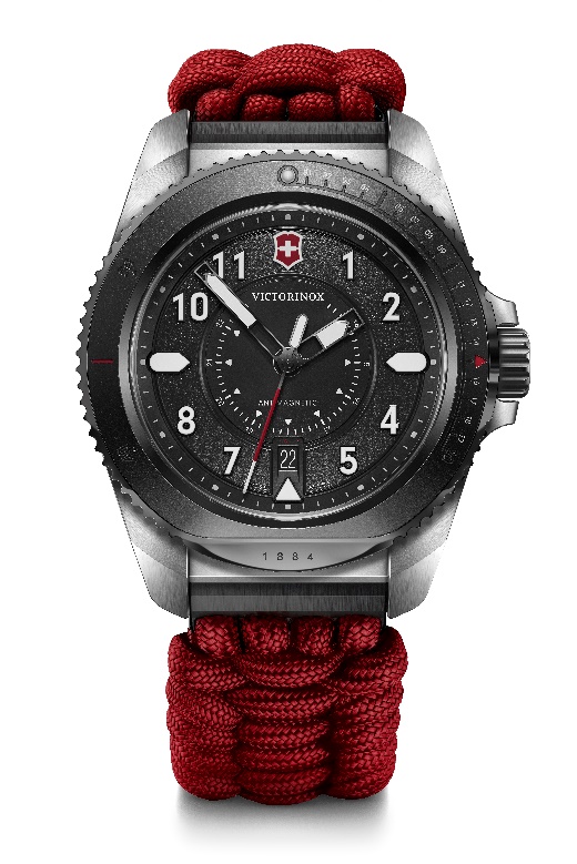 A watch with a red strapDescription automatically generated