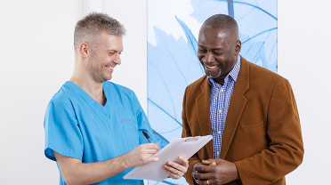 Patient man talking waiting area MRI