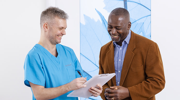 Patient man talking waiting area MRI