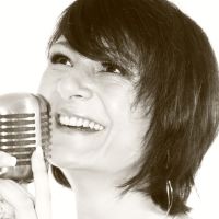 Coach vocal donne cours pour la prise de parole en public et l'expression orale