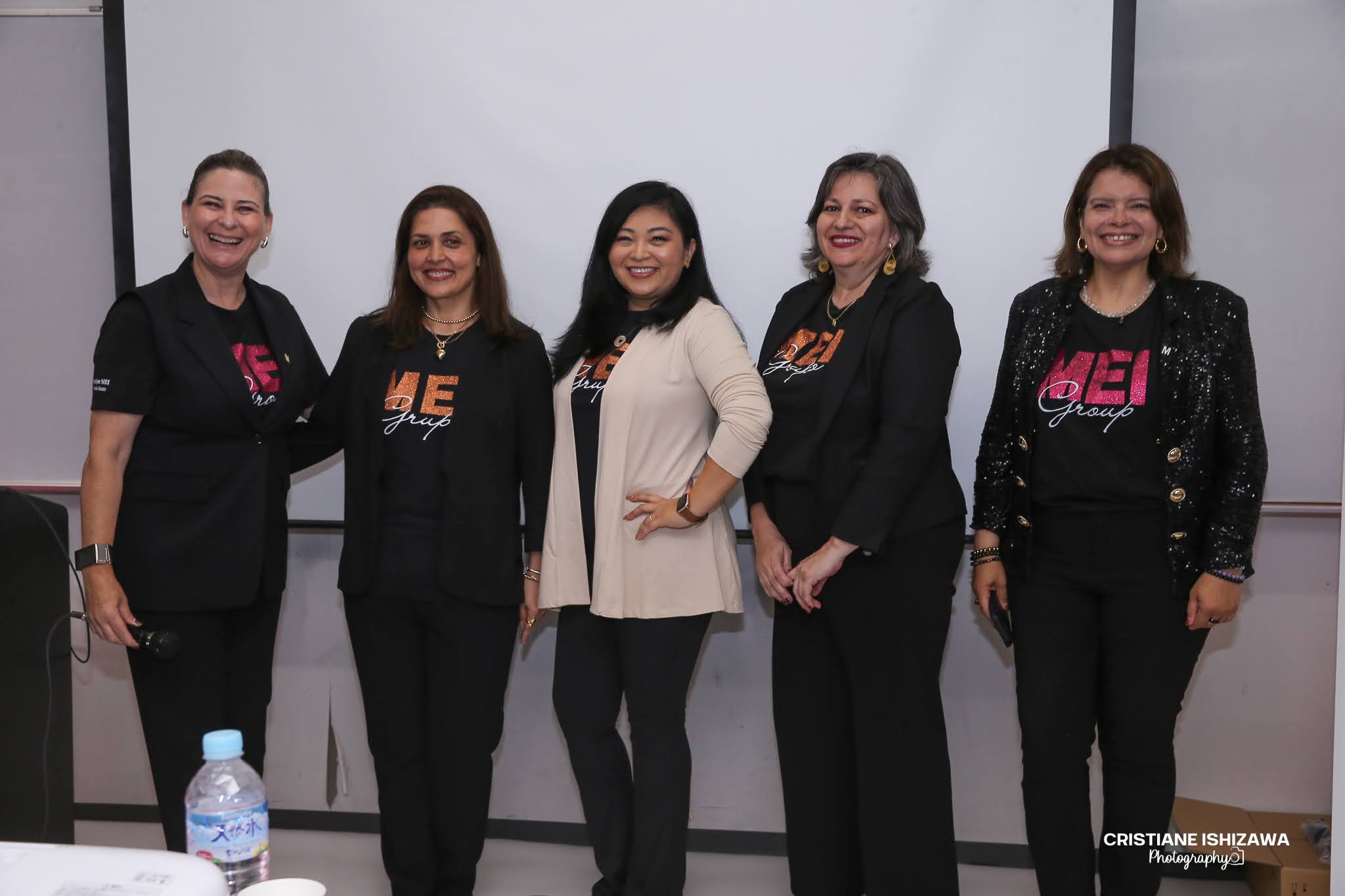 MEI GROUP members at an event