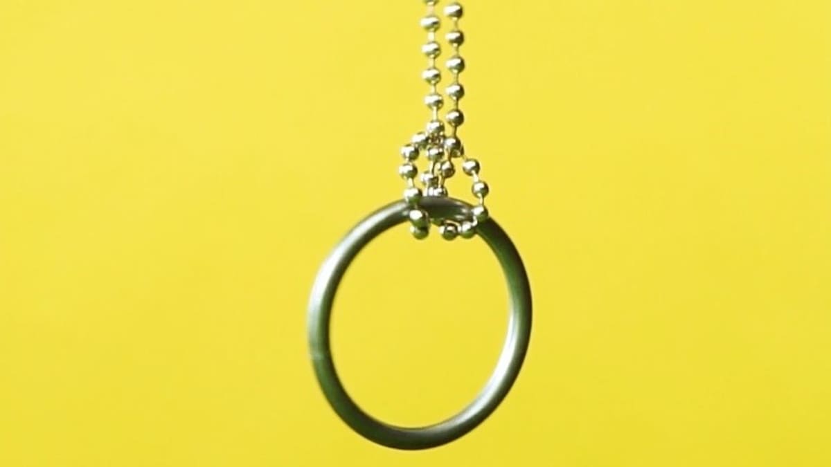 2Pcs Magic Ring and Chain Cool Magic Trick Props Metal Knot Ring On Chain HK 