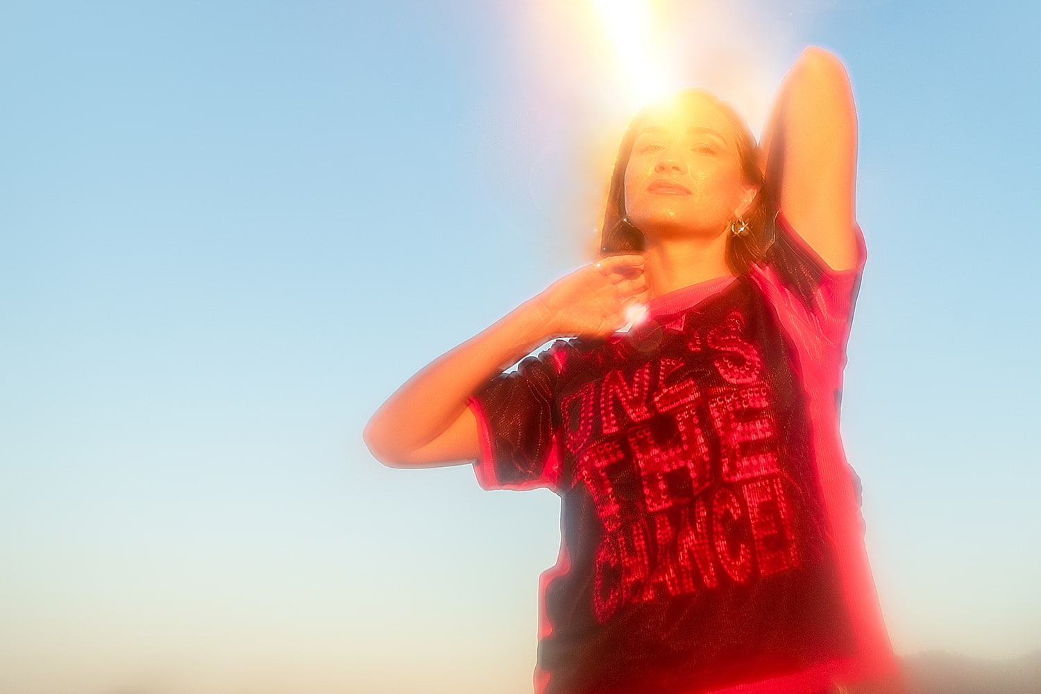 Kaytetye producer Rona standing proudly in the sunshine.