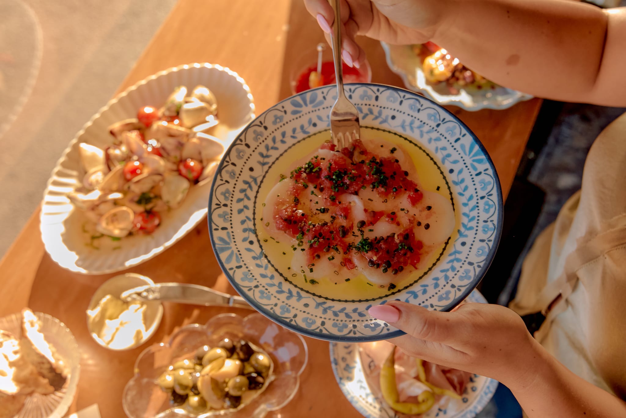 Raw scallop and tomato.