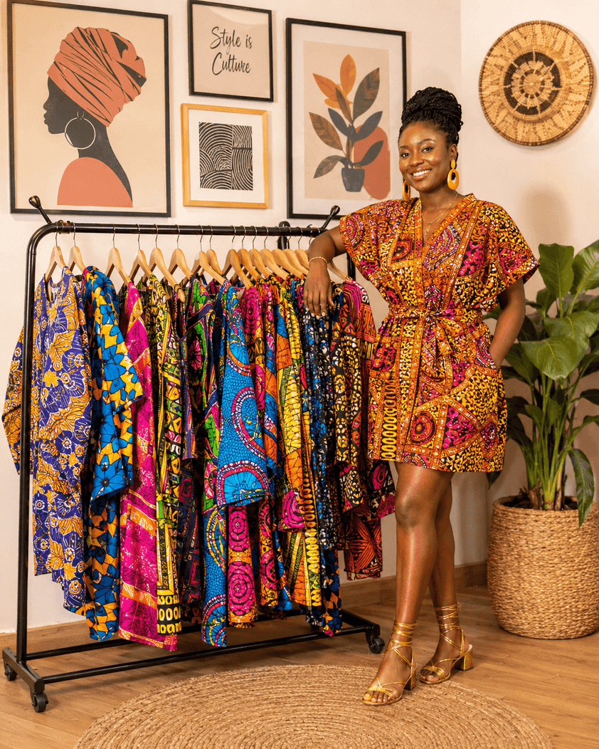 A Ghanaian boutique owner in her shop, ready to sell and get paid with StarPay