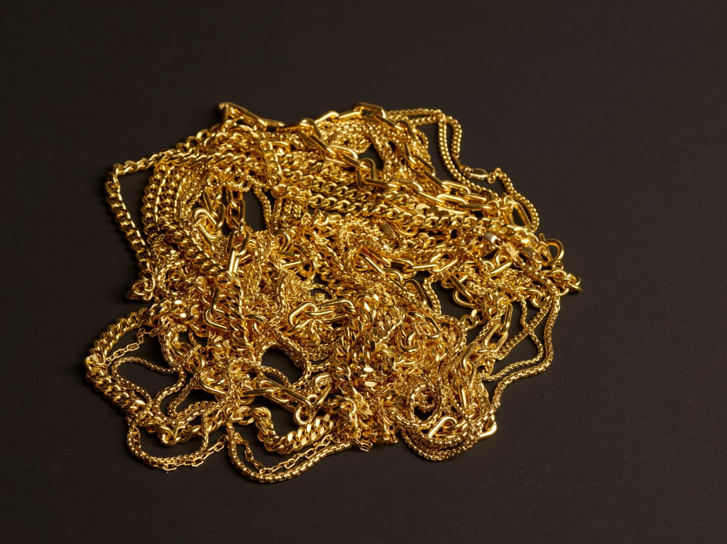 A Menē piece in pure 24k gold, showing the deep, warm color of pure gold rare in Western fine jewelry.
