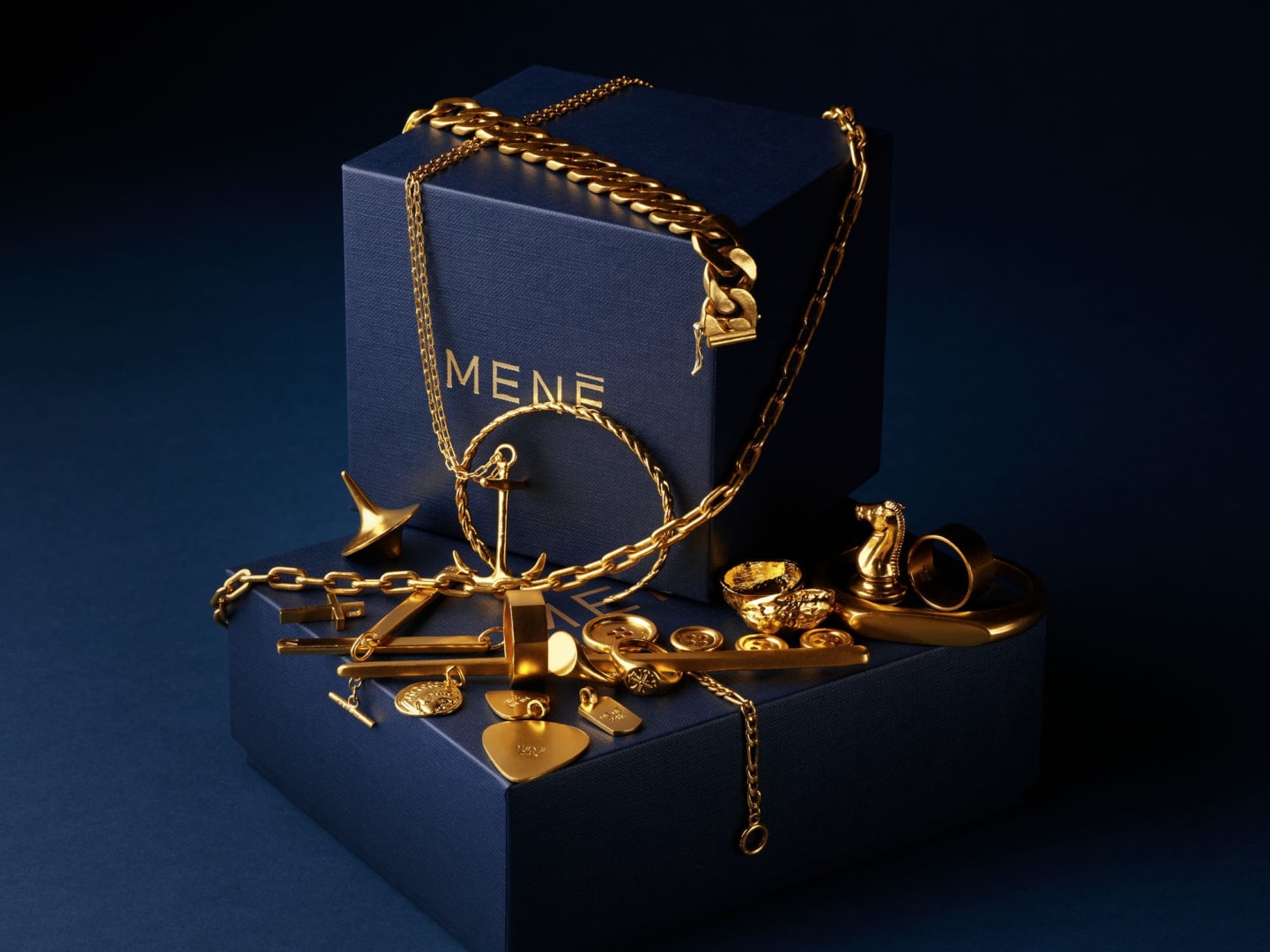 Menē 24k gold jewelry - bracelets, rings, charms, pendants, and chains.