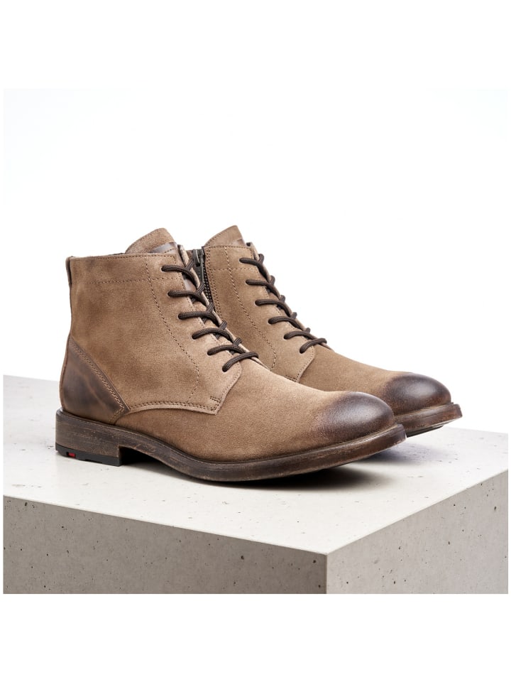 Schnürstiefel in gruen
