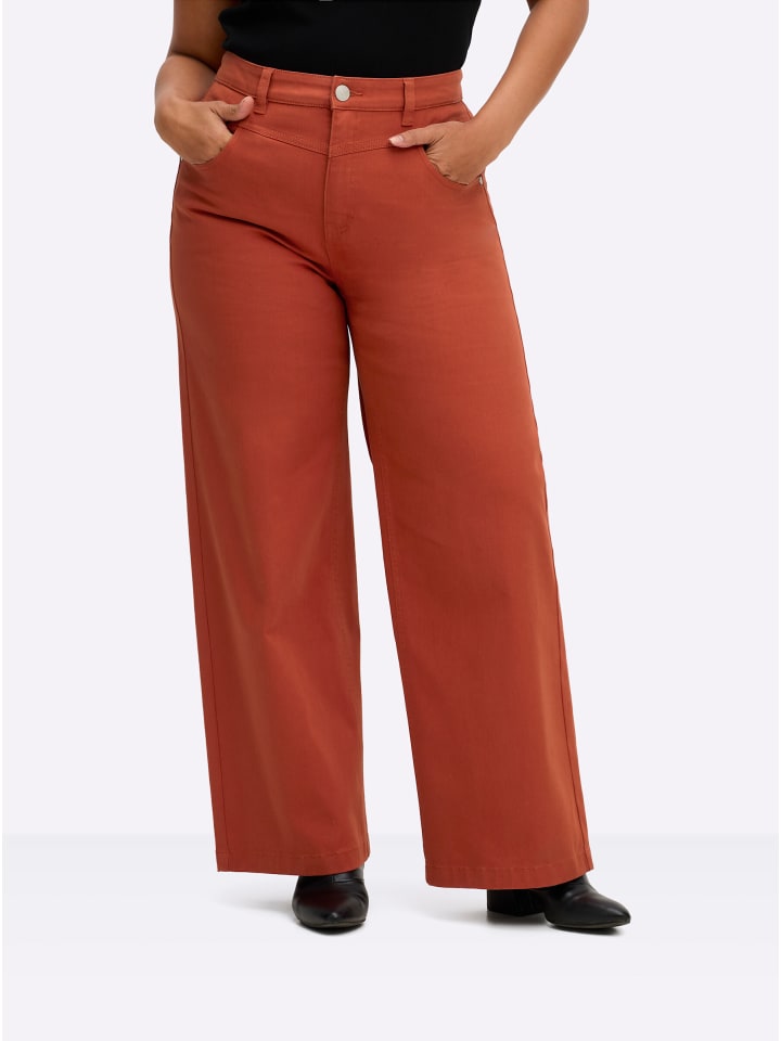 Jeans in rostrot