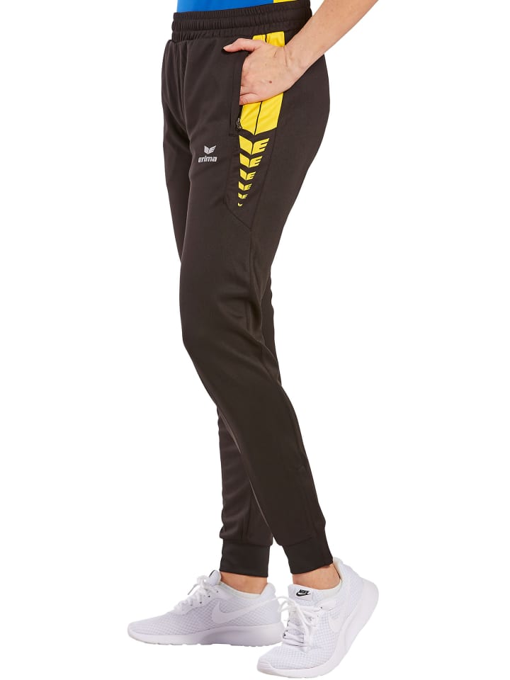 Damen Six Wings Trainingshose in schwarz/gelb