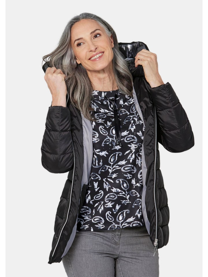 Lange Steppjacke mit Kapuze in schwarz