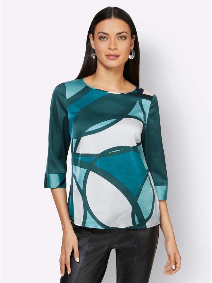 Bluse in ecru-petrol-bedruckt