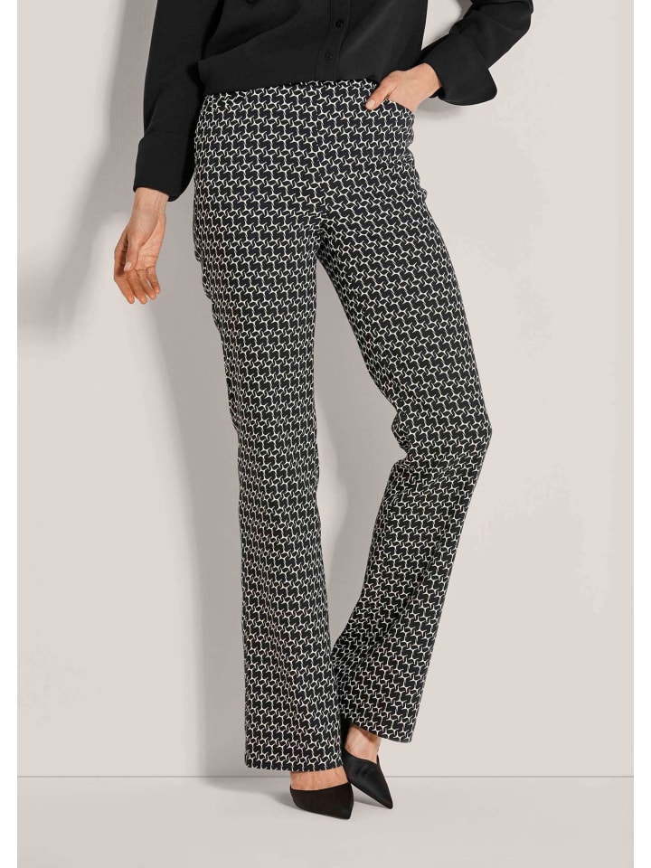 Elastische Printhose mit grafischem Muster in schwarz / wollweiß