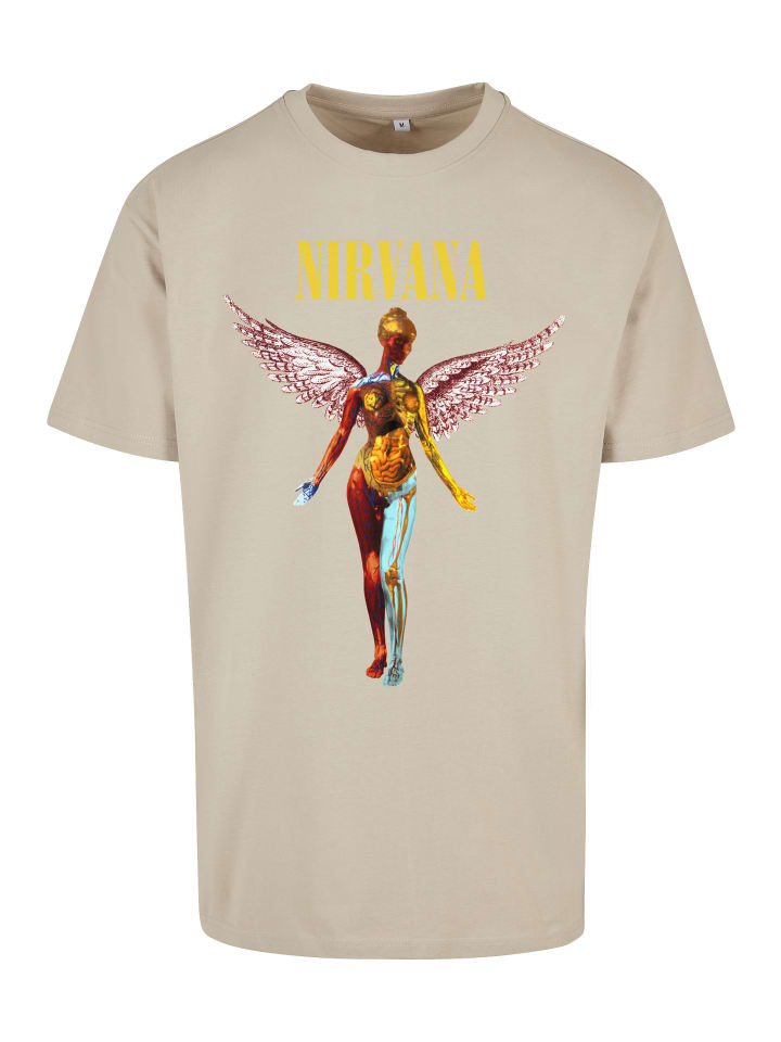 T-Shirt in wet sand
